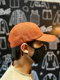 Gorra de gabardina color ladrillo